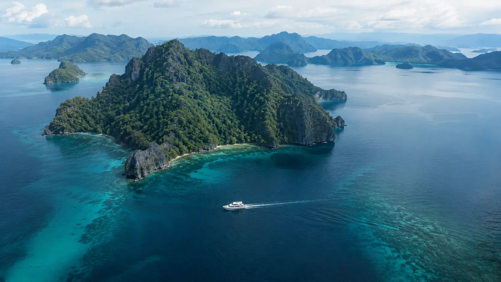 A tropical Philippine seascape with islands and clear turquoise water